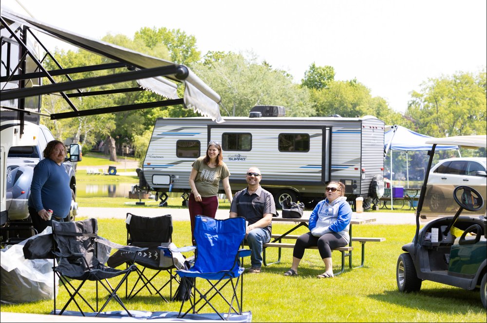Campers relaxing together at Willow Mill